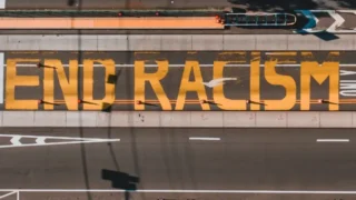 racism-sign-on-road-16x9