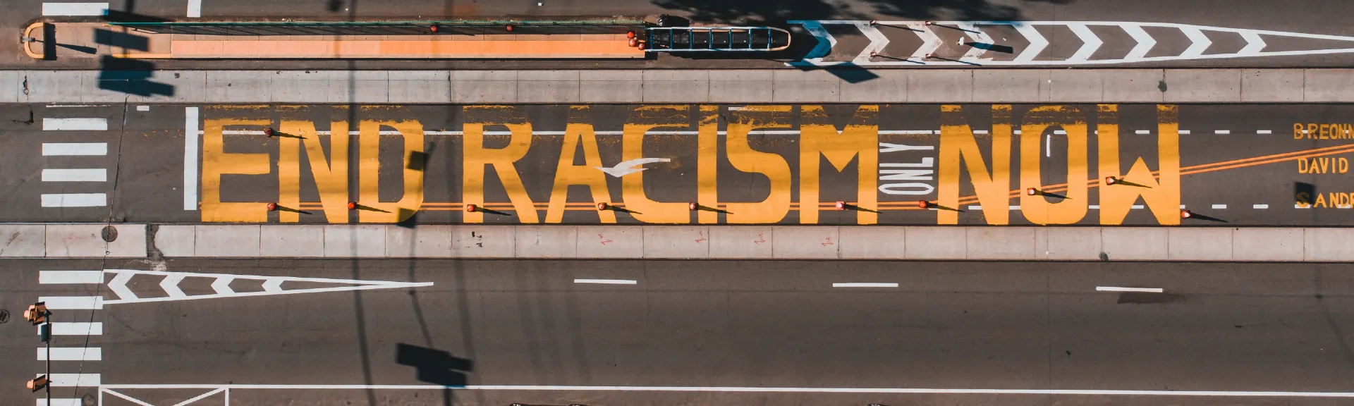 racism sign on road