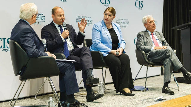 Former treasurer Josh Frydenberg makes a point during the panel discussion with Lorraine Finlay and Ronald Sackville